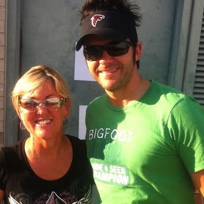 A man and woman standing next to each other.